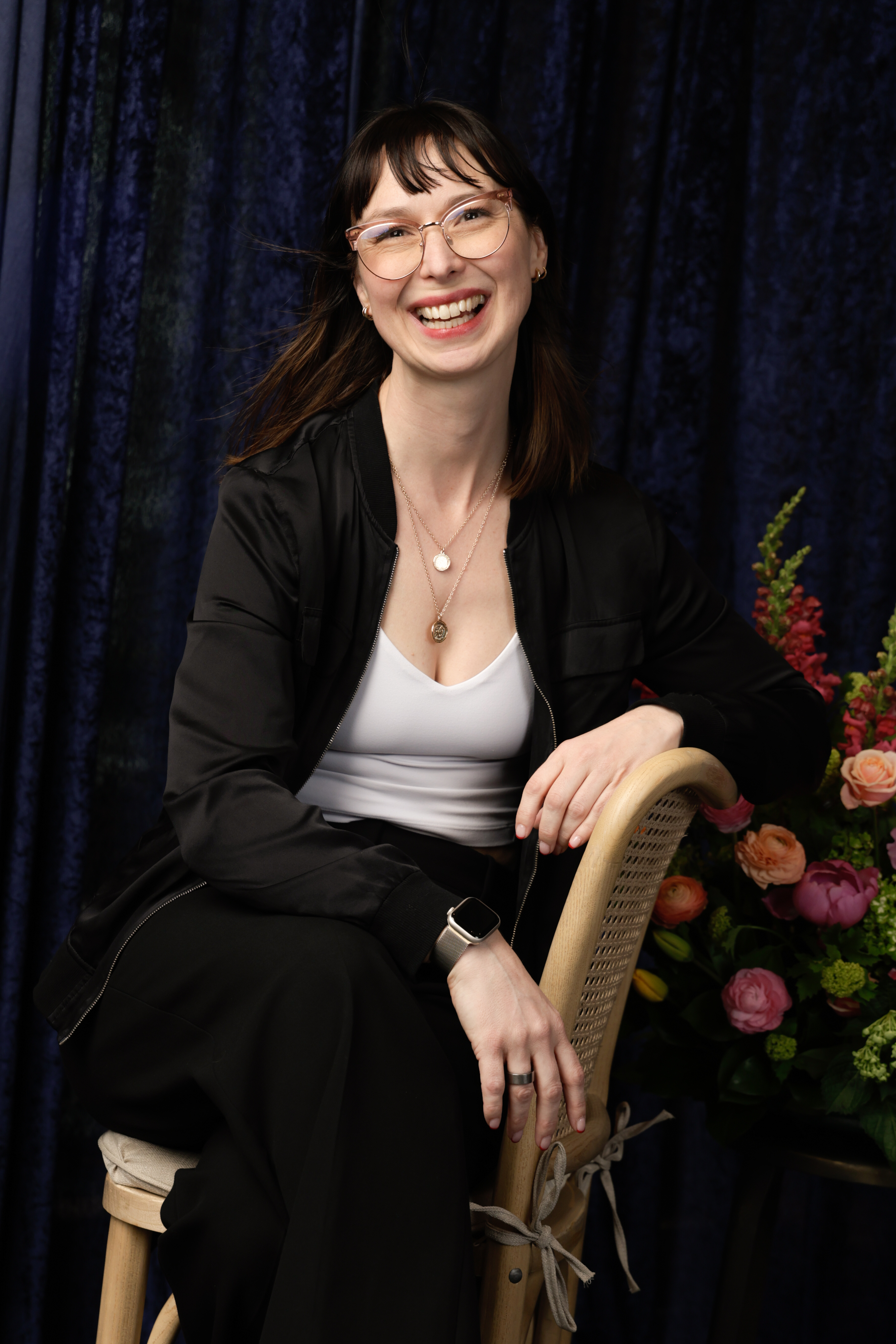 Dr. Jamie Knight with floral arrangement